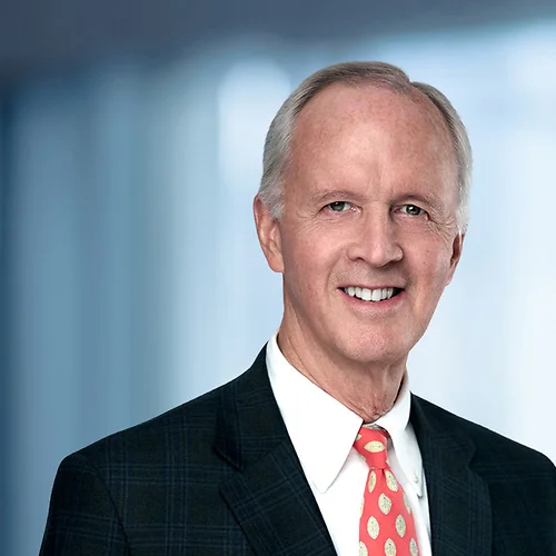 A photo of attorney Hobie Andrews against a softly blurred office background